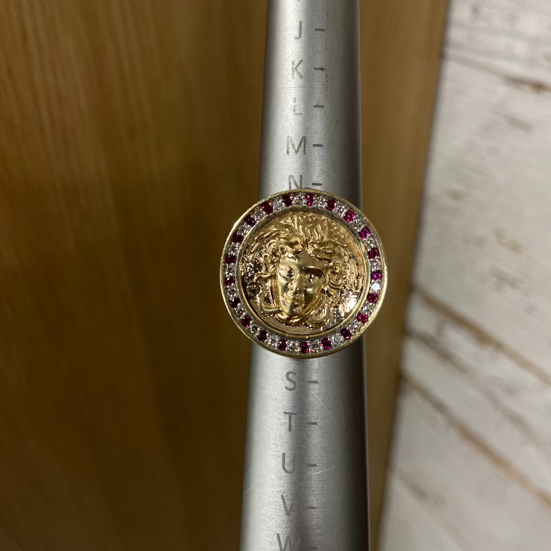 Medusa ring with diamonds and rubies